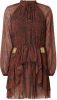 NIKKIE semi-transparante jurk Siva met paisleyprint en ruches oranjebruin/ zwart online kopen