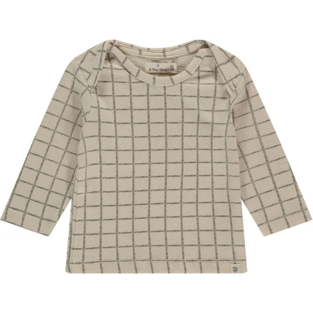 A Tiny Story longsleeve ecru met all-over print
