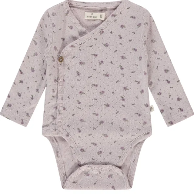A Tiny Story romper met overslag paars