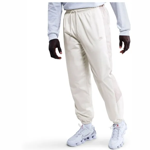 Nike Windrunner Pant - Trainingsbroek, wit/grijs Beige