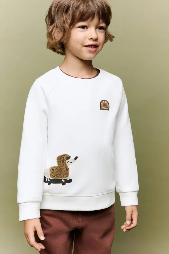 Mango Kids rechtvallende sweater met borduursels - naturel wit