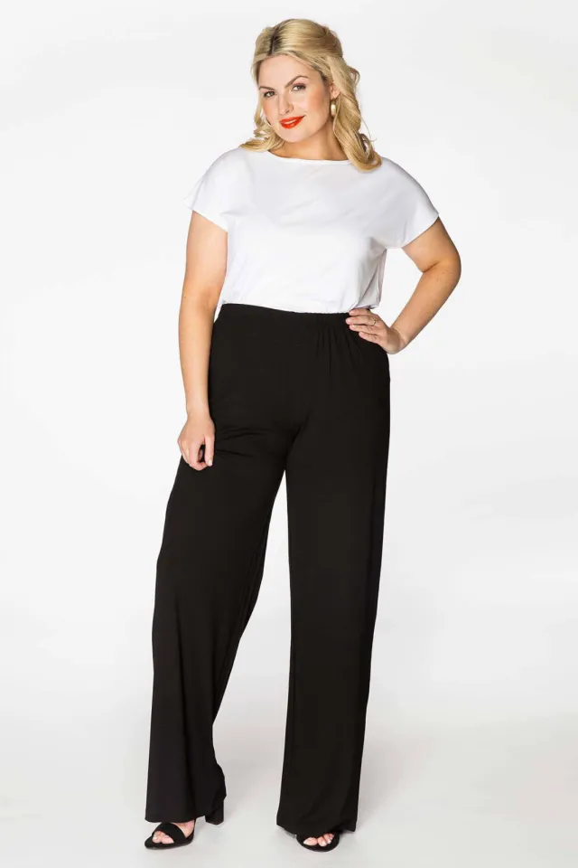 Yoek high waist bootcut fit broek van travelstof DOLCE zwart