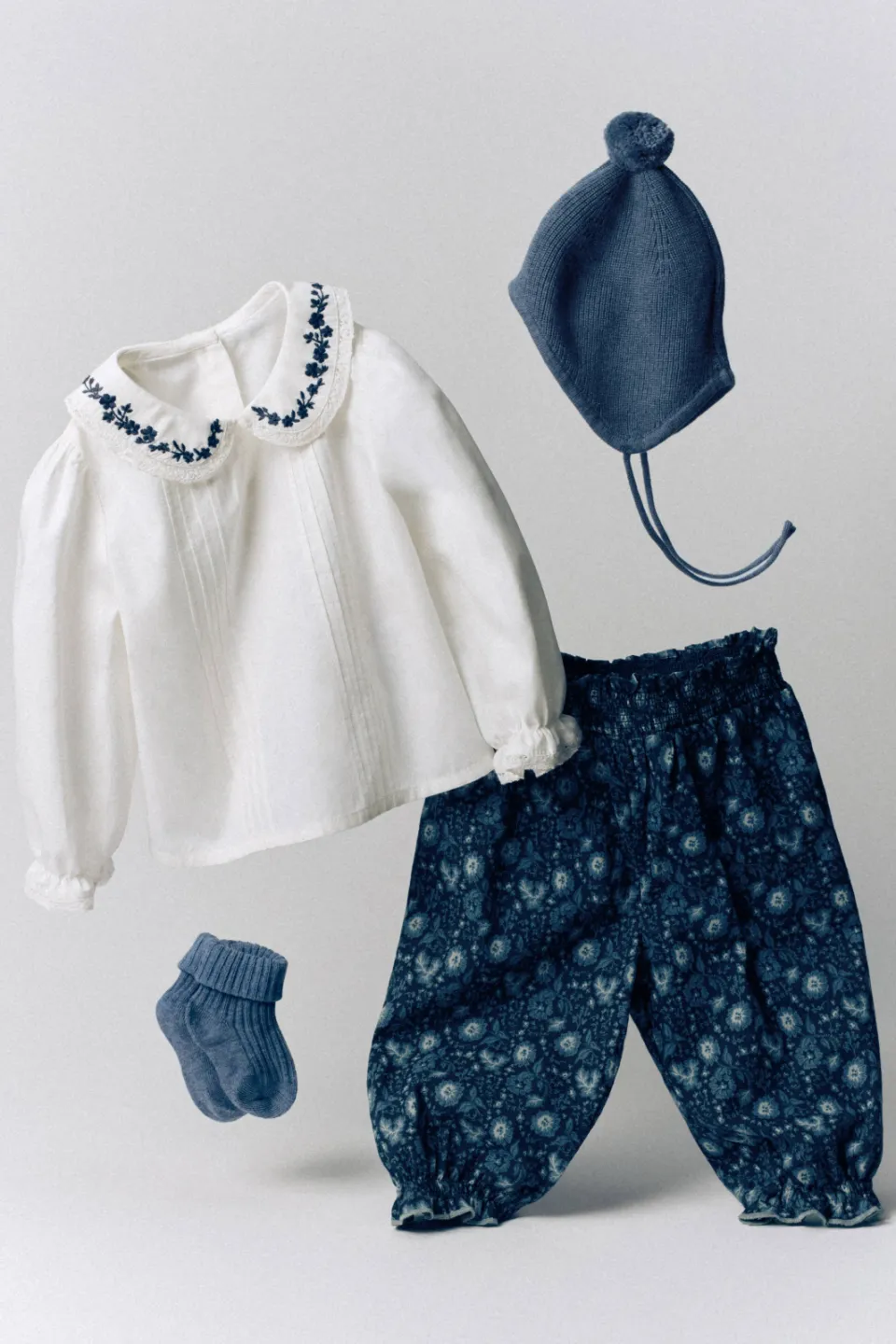 Mango Kids gebloemde ballonbroek donkerblauw